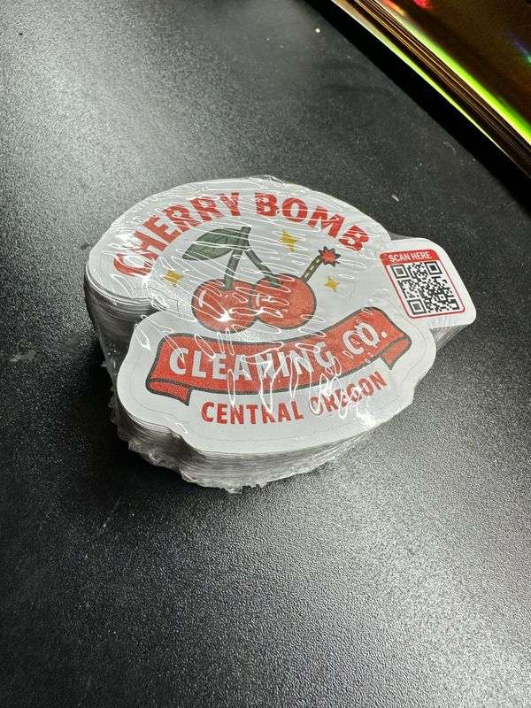 Cherry Bomb Cleaning Co sticker stack